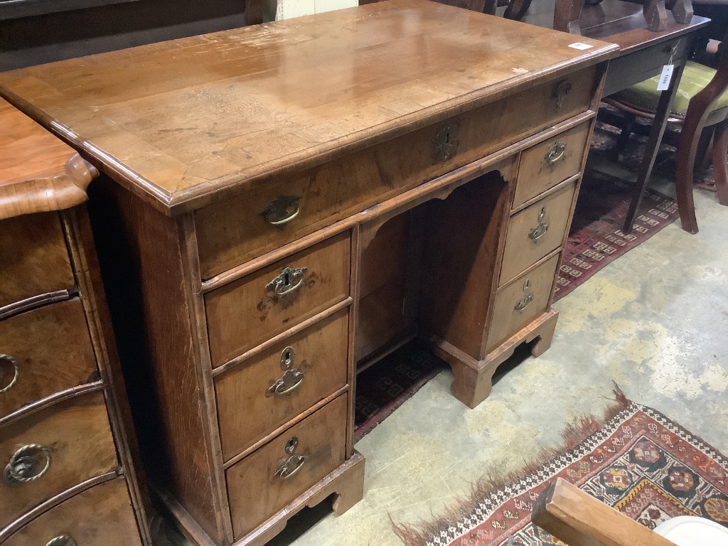 A William and Mary walnut and herringbone strung kneehole desk, length 101cm, depth 55cm, height 79cm